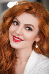 beautiful red-haired girl portrait close-up