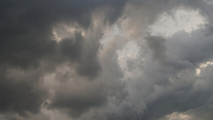 Naklejka na ściany i meble Dark storm clouds in the sky