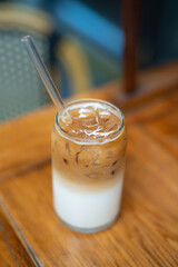 delicious milkshakes on the bar counter in a glass jar with a straw.