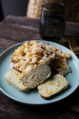 Kimchi with rice and tofu. Kimchi, traditional Korean side dish of salted and fermented vegetables.
