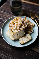 Kimchi with rice and tofu. Kimchi, traditional Korean side dish of salted and fermented vegetables.