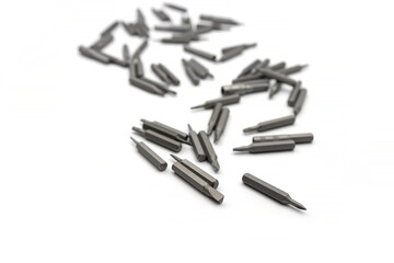 Changeable screwdriver bits isolated white. Many changeable screwdriver bits