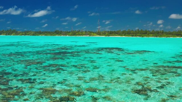 Beautiful, relaxing outdoor landscape of sean and tropical island beach. Aerial drone view.