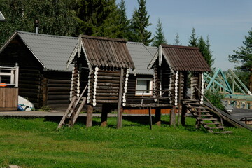 small wooden houses for children to play on the lawn