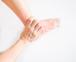Pain and sprain of the muscles of the feet and ankles, human body, on white background.