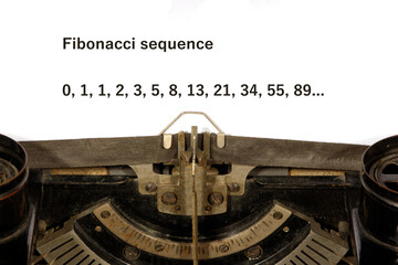 Closeup of a List of Fibonacci Numbers on paper at a vintage type writer machine