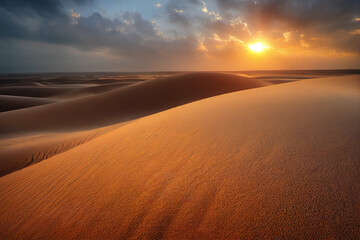 Fototapeta na wymiar Breathtaking sunset over Sahara Desert, illuminating vast sand dunes with golden hues, revealing intricate textures. Captures the serene beauty of nature's vastness in Africa 
