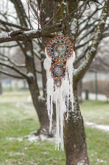 Close up white dream catcher bohemian craft rainy day outdoors