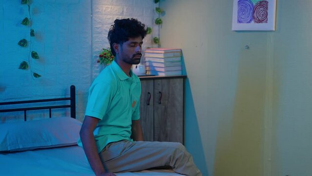 young man walking in sleep at bedroom during midnight at home - concept of sleepwalking, sonamubulate or disease