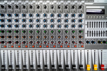 Professional sound studio audio mixing console with recordings, top view