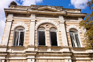Broken windows in the old high school.