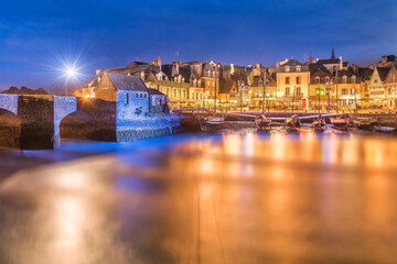 Scenic view of Port Saint-Goustan, Bretagne France during blue hour with city lights on