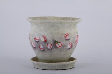 Plant pot with petal art and faded texture