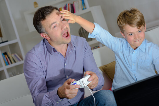 dad and son and video game