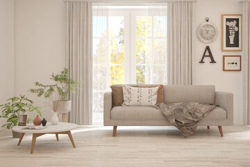 Stylish room in white color with sofa and autumn landscape in window. Scandinavian interior design. 3D illustration