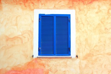 old window with shutters