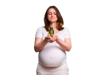 Body oil for pregnant woman, studio shot on white background