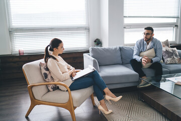 Patient talking with therapist in clinic