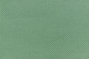 Cross Stitch Fabric Texture.
Green canvas. Green fabric for embroidery.