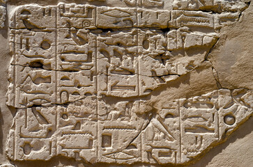 ancient hieroglyphs on a stone wall in egypt