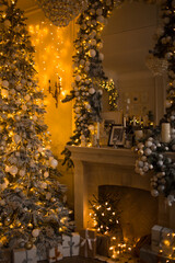 warm and cozy evening in Christmas room interior design,Xmas tree decorated by lights presents gifts,toys, deer,candles, lanterns, garland lighting indoors fireplace.holiday living room.magic New year