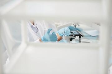 background image a scientist is conducting research in a laborat