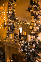 Obraz na płótnie Canvas warm and cozy evening in Christmas room interior design,Xmas tree decorated by lights presents gifts,toys, deer,candles, lanterns, garland lighting indoors fireplace.holiday living room.magic New year