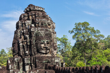 Fototapeta premium Ancient stone face of Bayon temple, Angkor, Cambodia