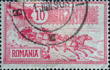 ROMANIA - CIRCA 1903: a postage stamp from Romania , showing a galloping horse-drawn carriage....