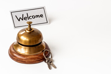 Hotel service bell with keys. Booking and checkin concept