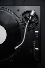 Dj turntable plays vinyl record with music. Professional audio equipment for hip hop disc jockey