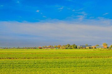 Sunrise over landscape in the polder Rietveld n Alphen aan den Rijn with a panoramic view of the...