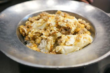 omelette, omelet or fried egg and rice or rice topped with stir fried egg