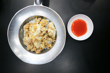 omelette, omelet or fried egg and rice or rice topped with stir fried egg