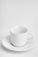Obraz na płótnie Canvas white cup on white background