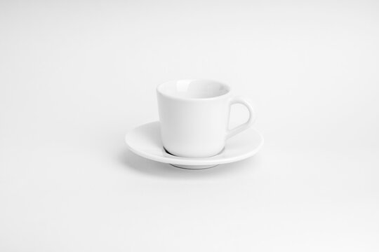 High Key  white Espresso cup in center of image