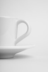 white cup on white background
