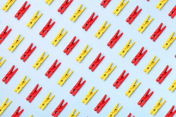 Formation of objects, repetitive group of clothespin colorful pattern, crowd top view