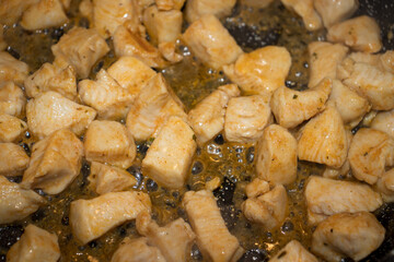 Frying Pan with Roasted chicken. Selective focus