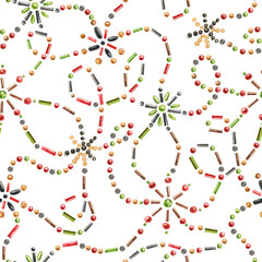 Bright, vintage background with beadwork and glass beads on a white background. Seamless pattern with beaded ornament. Testura for textiles, fabrics, packaging paper.