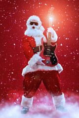 cool santa playing guitar