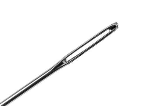 Needle eye close-up. Needle eye isolated on white background.