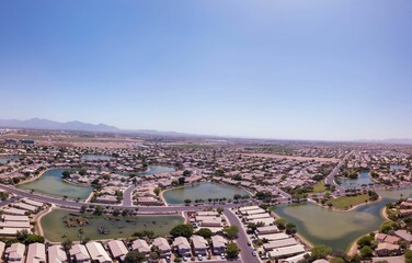 Aerial panoramic shot of the Avondale Lakes and surrounding buildings in Arizona
