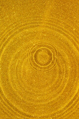 Fototapeta na wymiar Golden glitter circles abstract background, golden glitter texture