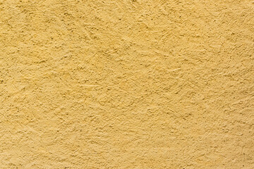 Texture giallo ocra molto ruvida, muro, cemento, sfondo grafico