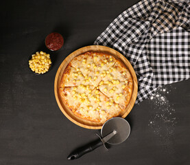 Delicious pizza with a sophisticated background of cheese and vegetables