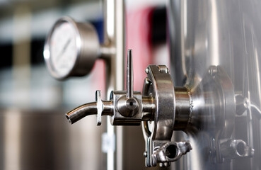 Beer making equipment in a commercial brewery.