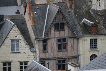 Naklejka premium closeup on half timbered house downtown Chinon in the Loire valley France