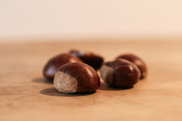 Sweet chestnuts on a wooden table