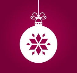 Christmas ball ornament with snowflake on purple background. Christmas card.